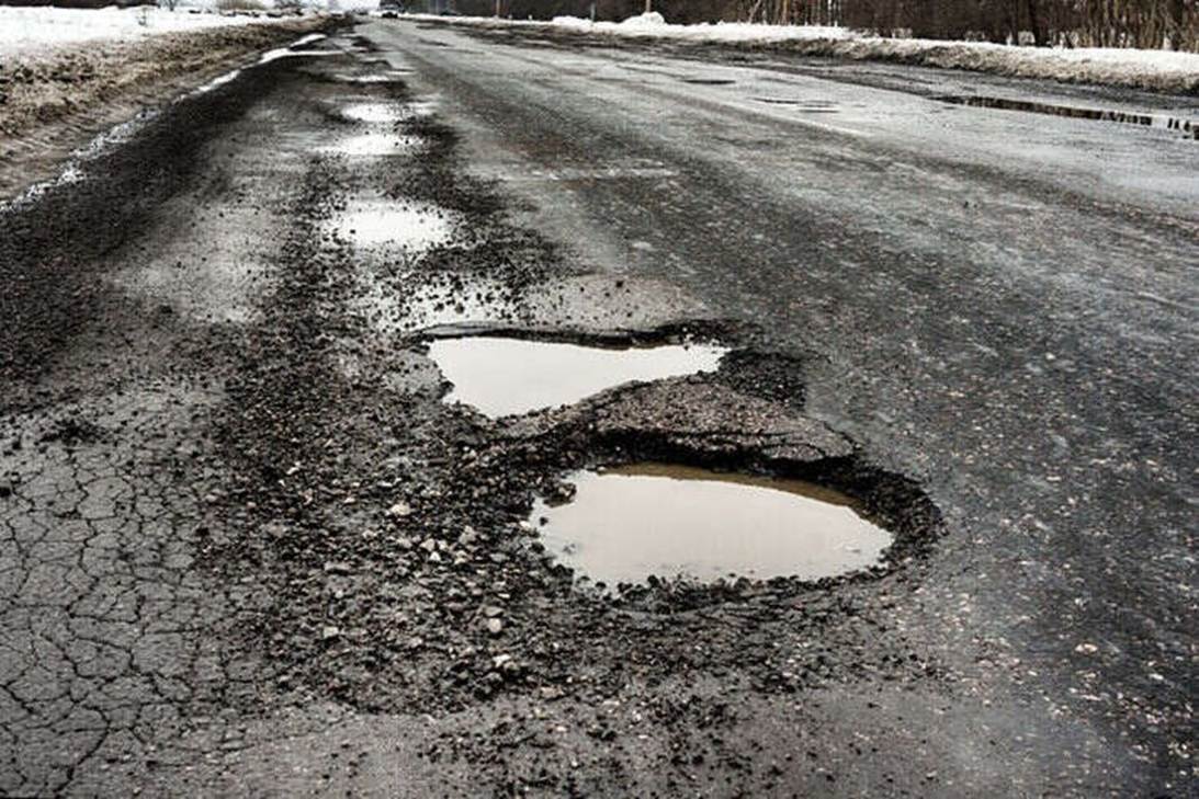 Potholes on a road

AI-generated content may be incorrect.